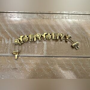 Vintage Hair and Makeup Gold Tone Charm Bracelet